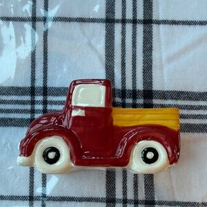 Red and Yellow Ceramic Truck Decor